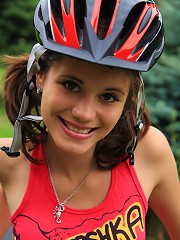 Teen sensation Little Caprice rides bicycle naked