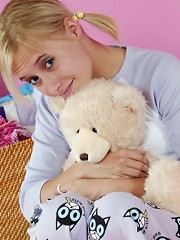 Cute blonde looking sweet in pajamas